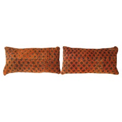 Pair of Decorative Antique Persian Saraband Carpet Pillows with Floral Element
