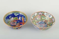 A pair of decorative Chinese bowls, porcelain and cloisonné. 20th C.