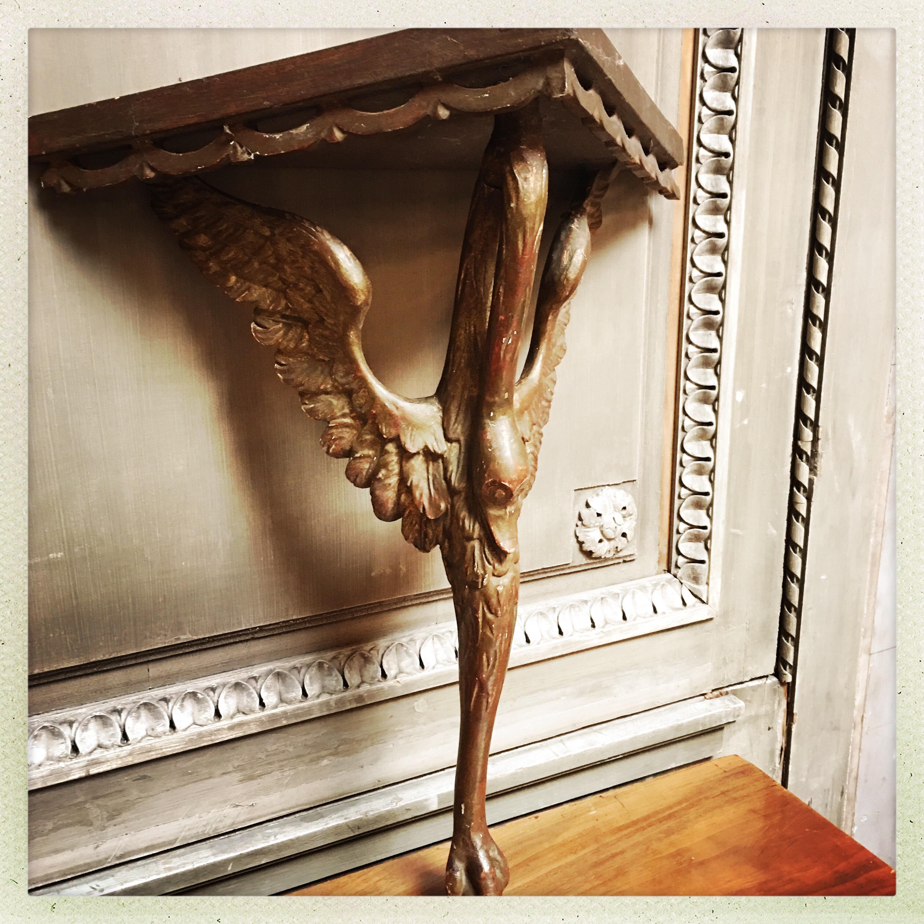 A pair of decorative Italian neoclassical style brackets.