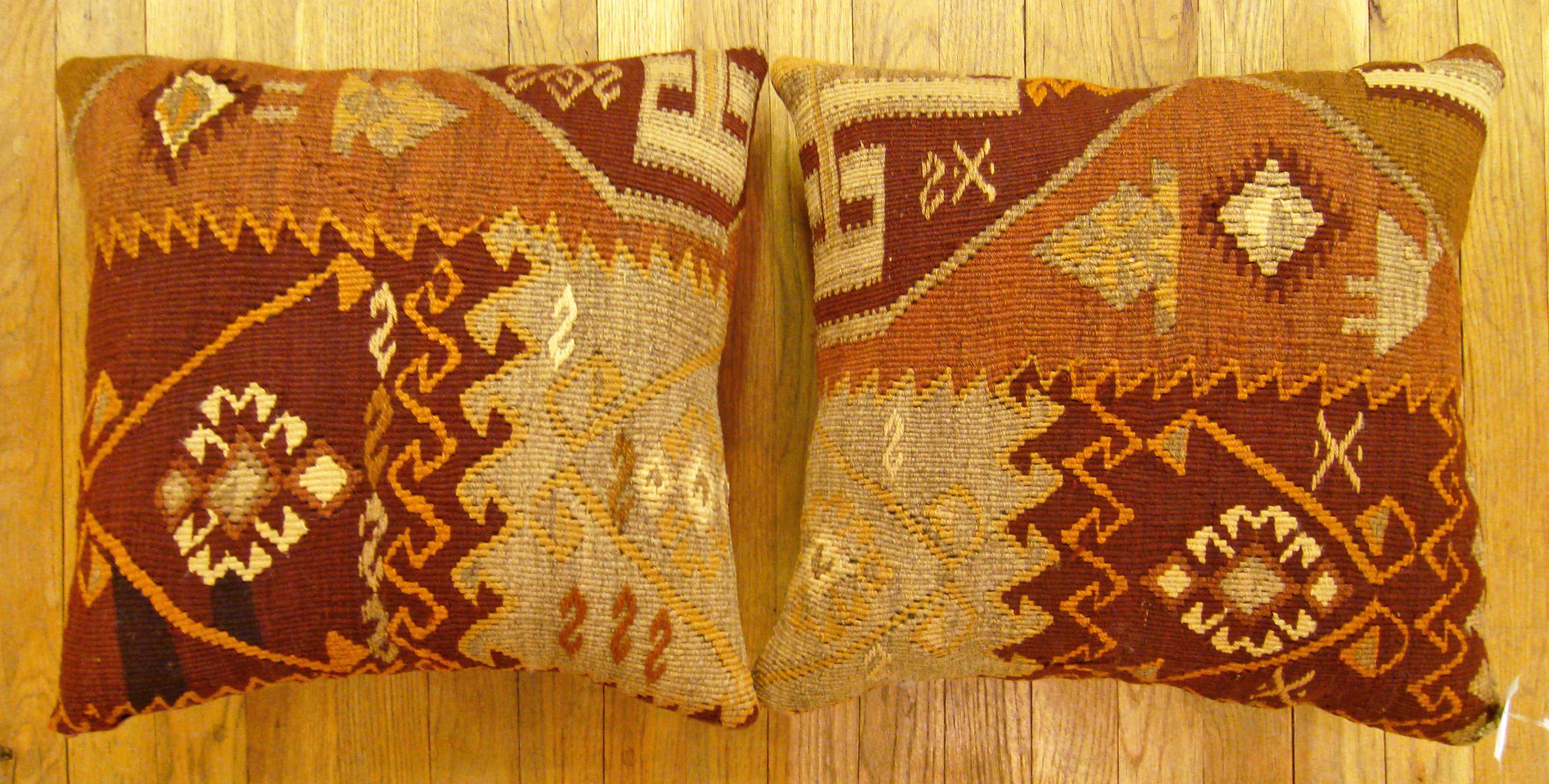 A pair of Vintage Turkish Kilim rug pillows; size 17