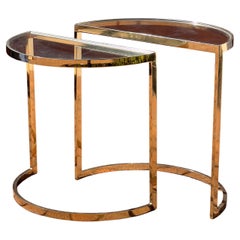 A pair of demi-lune gilt end tables, 1970s