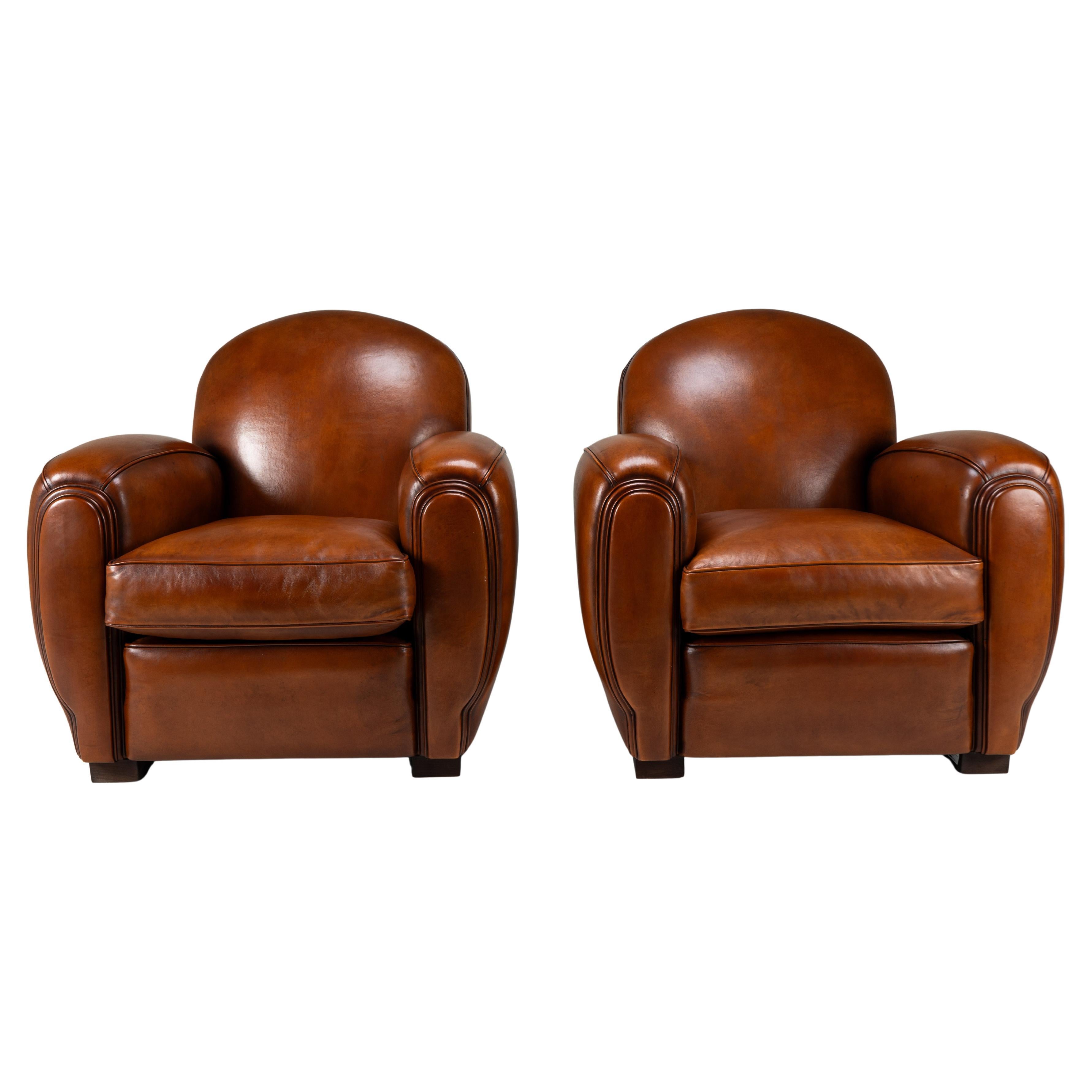 Paire de chaises Demi Lune en peau de mouton