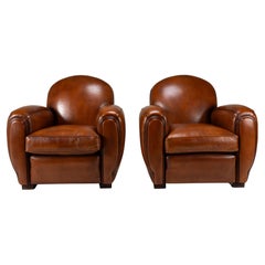 A Pair of Demi Lune Sheepskin Chairs