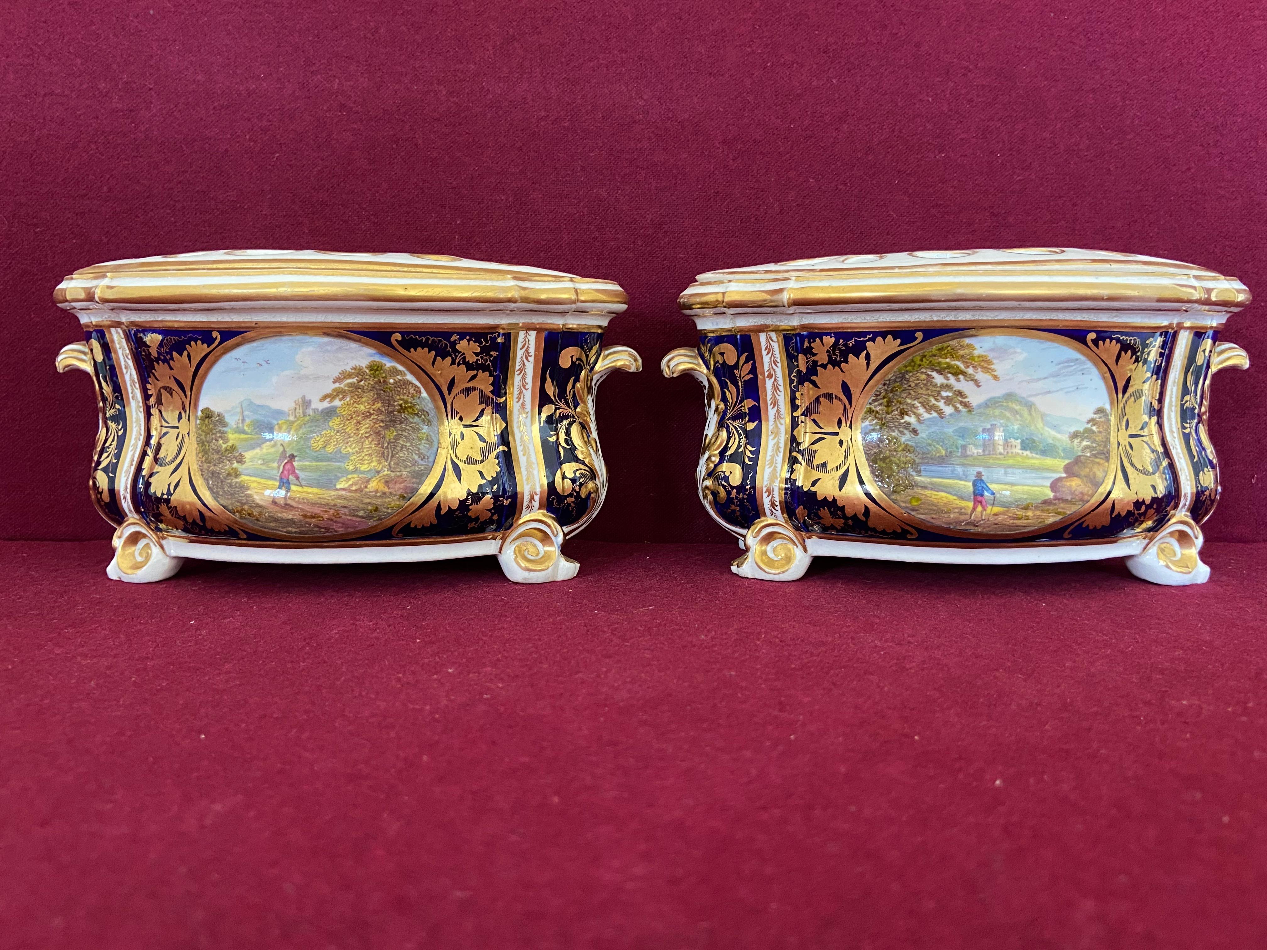 A fine pair of Derby bough pots c.1815 painted with topographical landscapes 'In Italy' probably by Robert Brewer.

Description in red on the base along with incised shape number 'No 76'.

Condition: Slight hairline crack to the base of one of