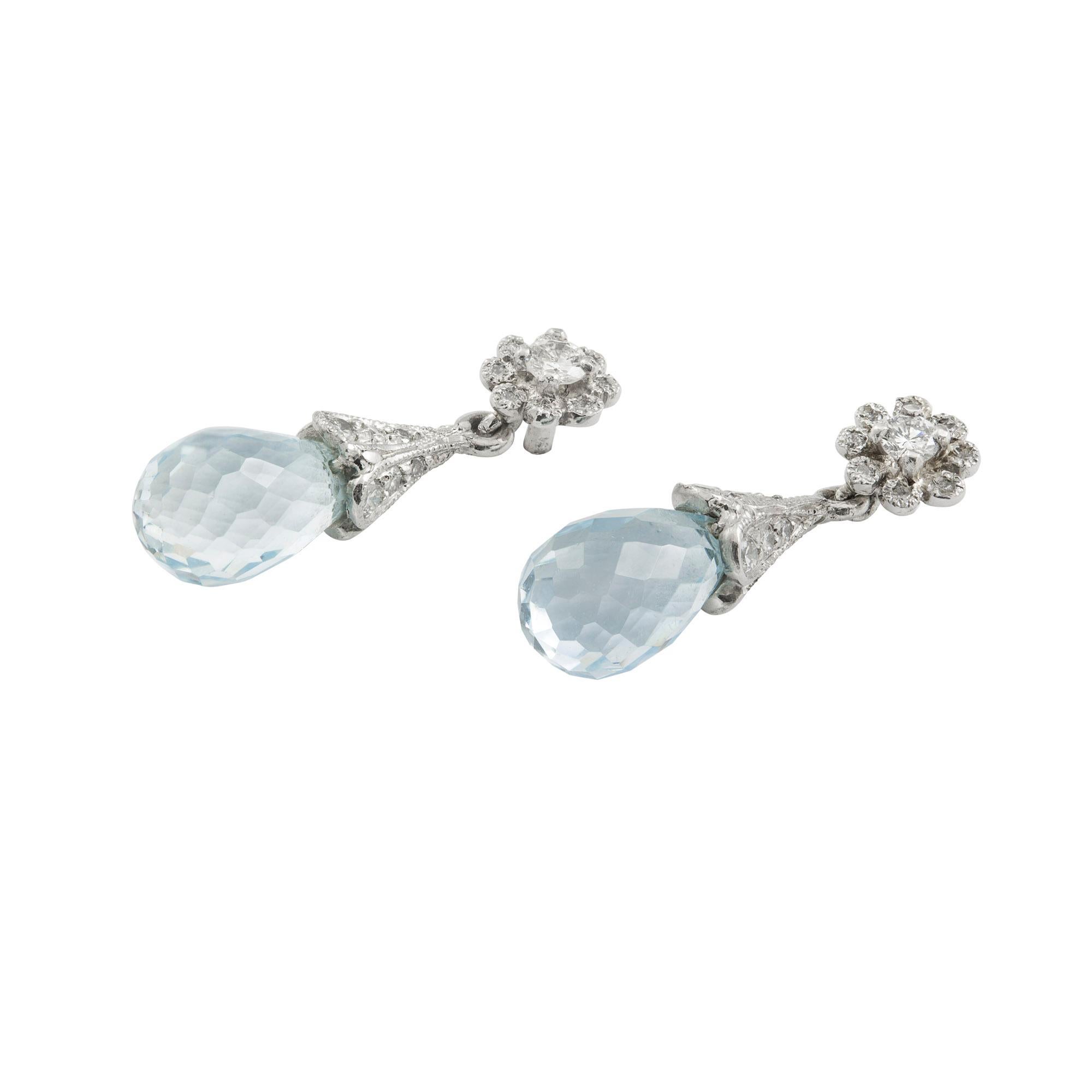 A pair of diamond and aquamarine briolette drop earrings, each earring comprising aquamarine briolette drop weighing total of 0.6 carats with diamond set cap suspended from a diamond-set daisy cluster top, all millegrain set to a white mount with