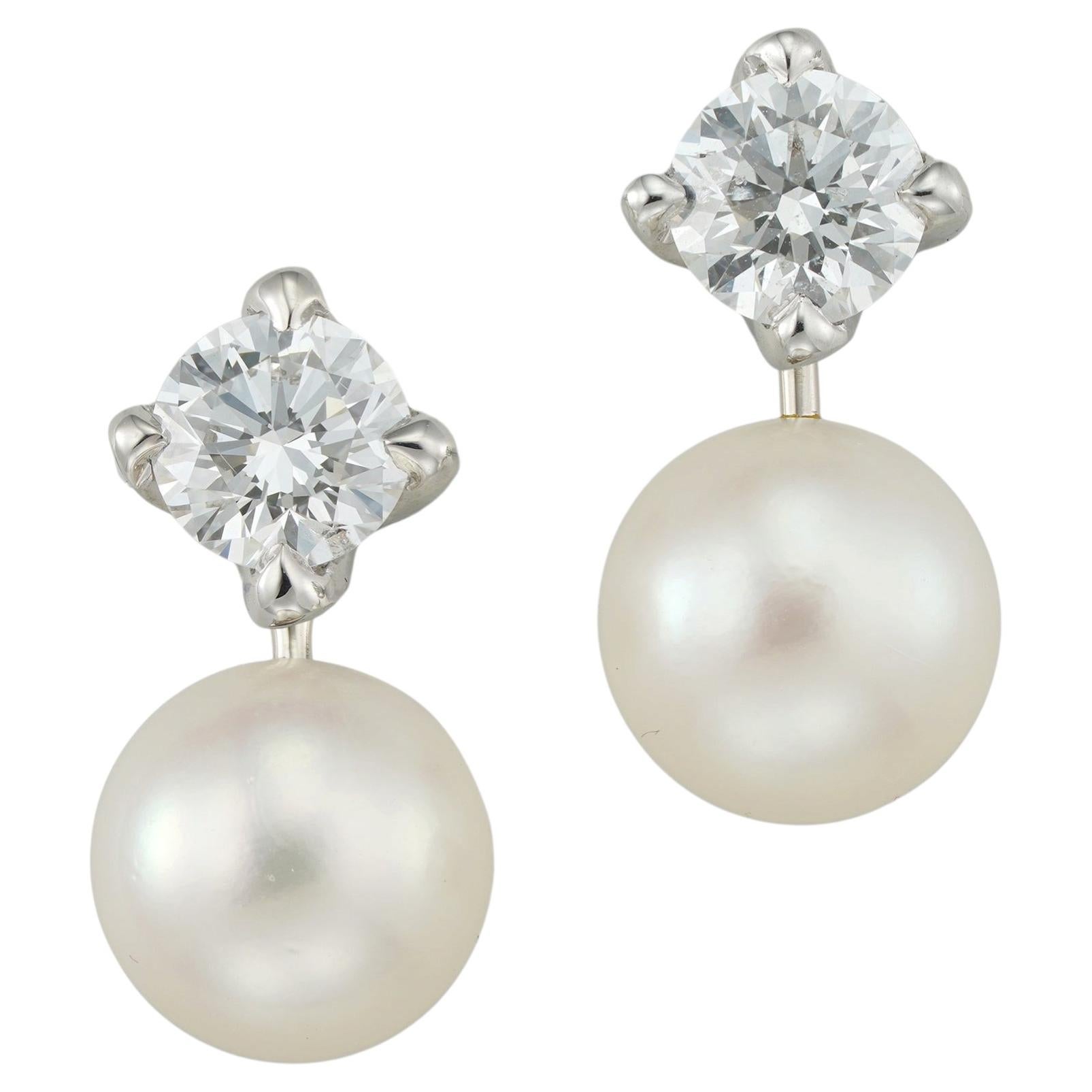 A pair of diamond and cultured pearl earrings For Sale