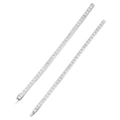 A pair of Diamond bracelets set with brilliant cut diamonds