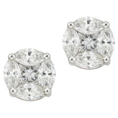 A pair of diamond cluster earrings