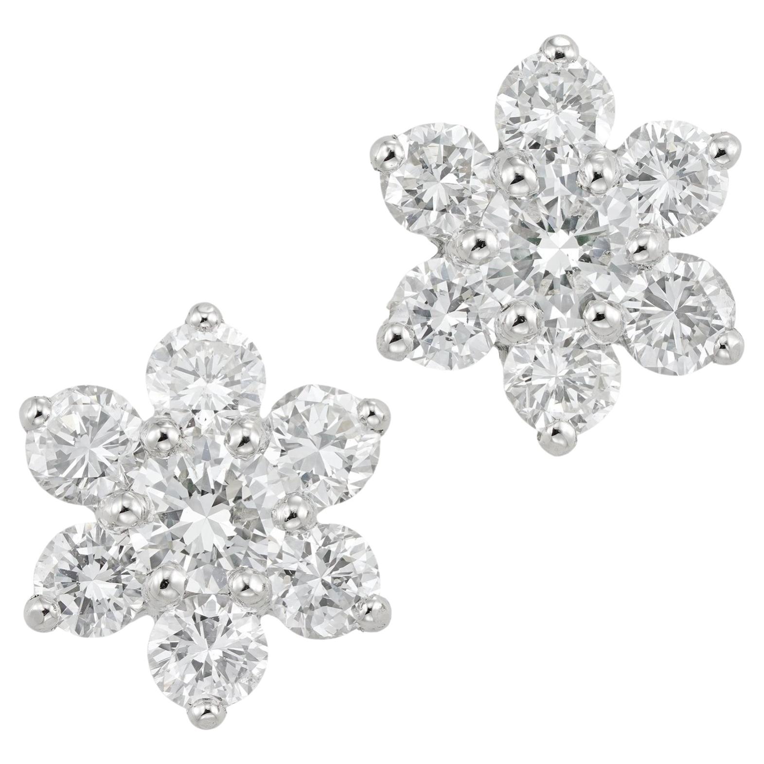 A pair of diamond cluster earrings For Sale