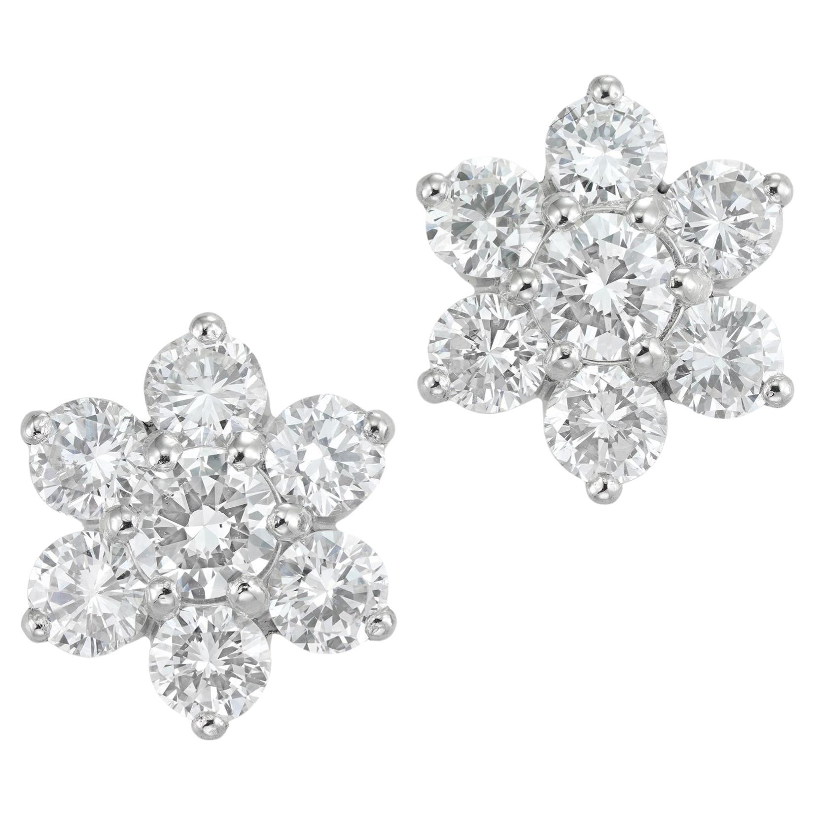 A pair of diamond cluster earrings For Sale