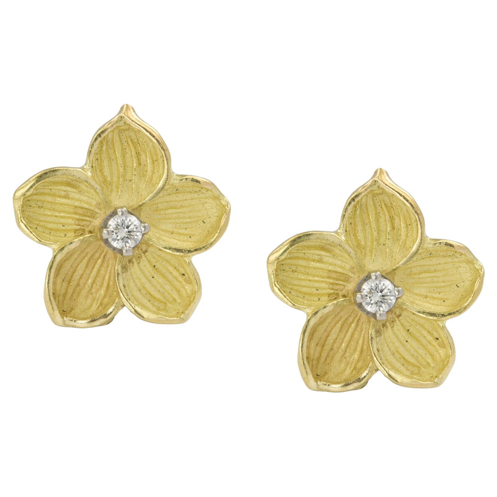 A pair of diamond-set yellow gold flower earrings For Sale