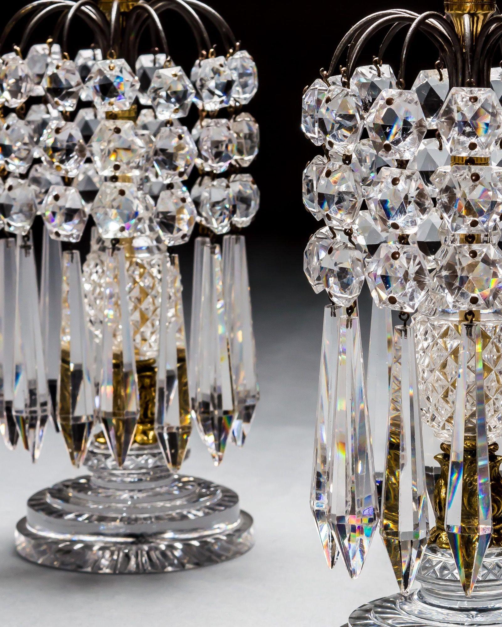 English A Pair of Diamond & Step Cut Regency Candlesticks For Sale