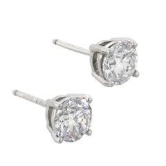 A pair of diamond stud earrings