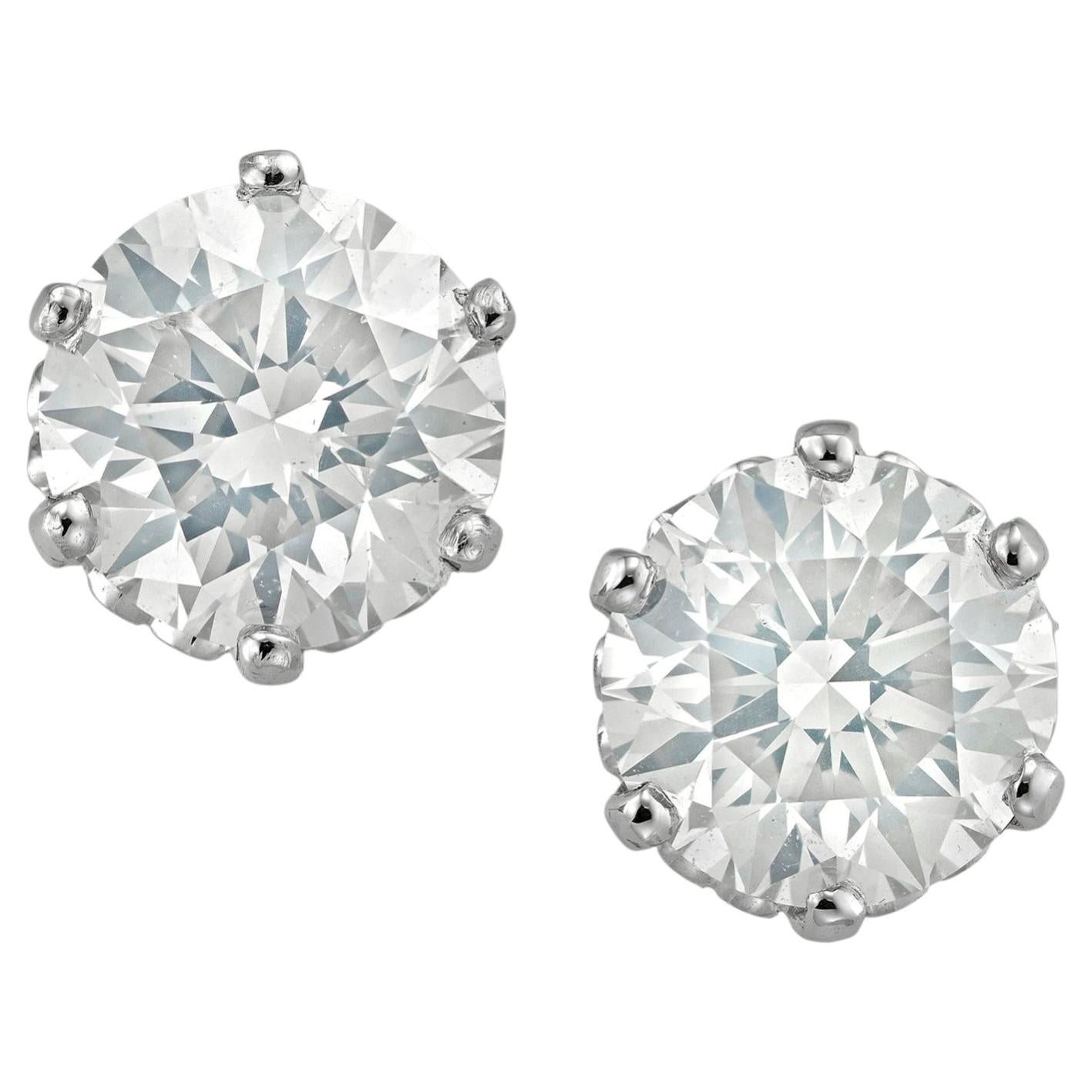 A pair of diamond stud earrings