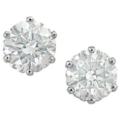 A pair of diamond stud earrings