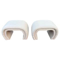 A pair of directional "Waterfall" Upholstered Bench Ottomans after Springer