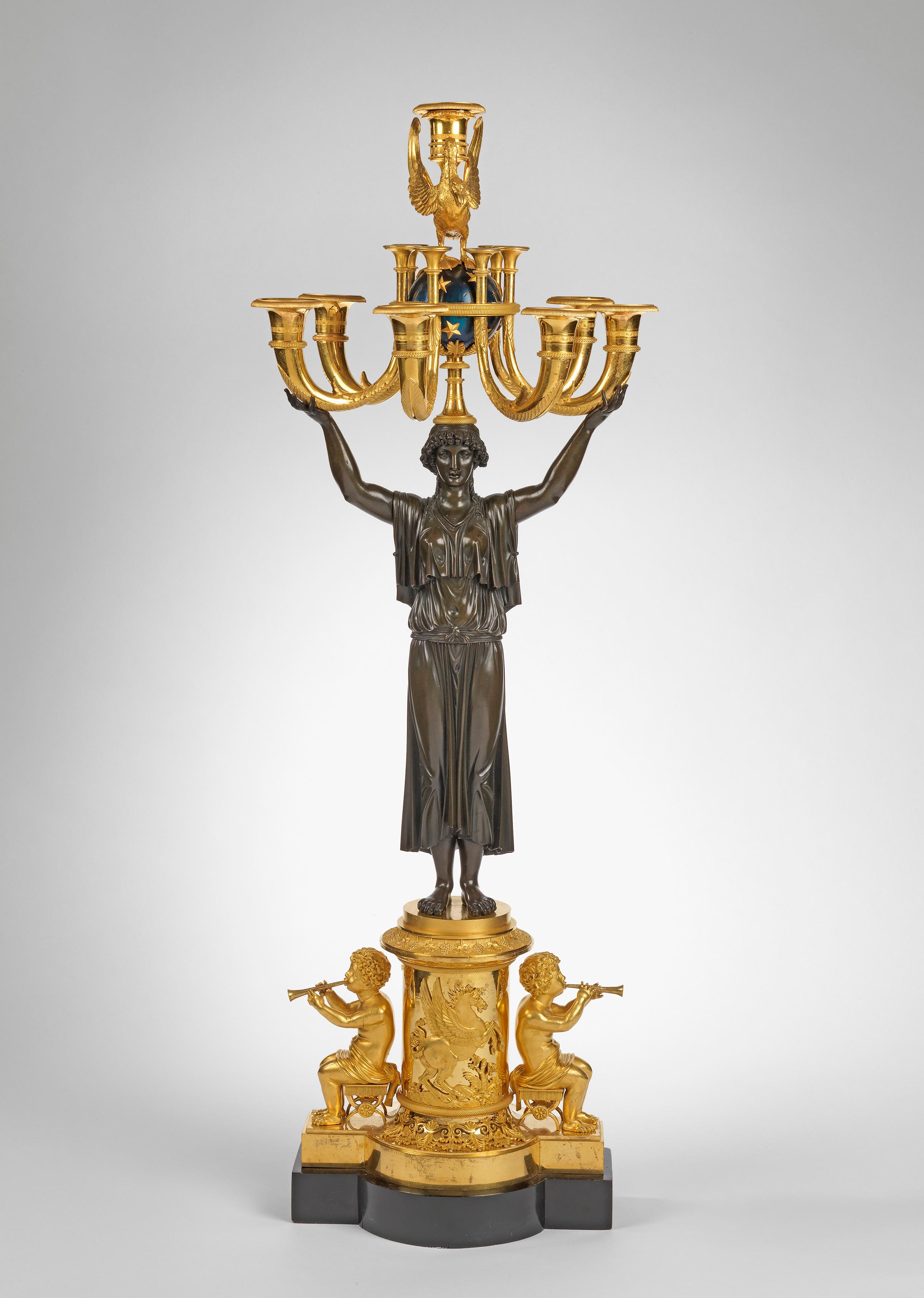 The seven light candelabra are each modelled as a classical figure holding a celestial globe issuing six musical horn-shaped branches and surmounted by a swan with a further branch, on a circular base with a Pegasus figure flanked by two Putti