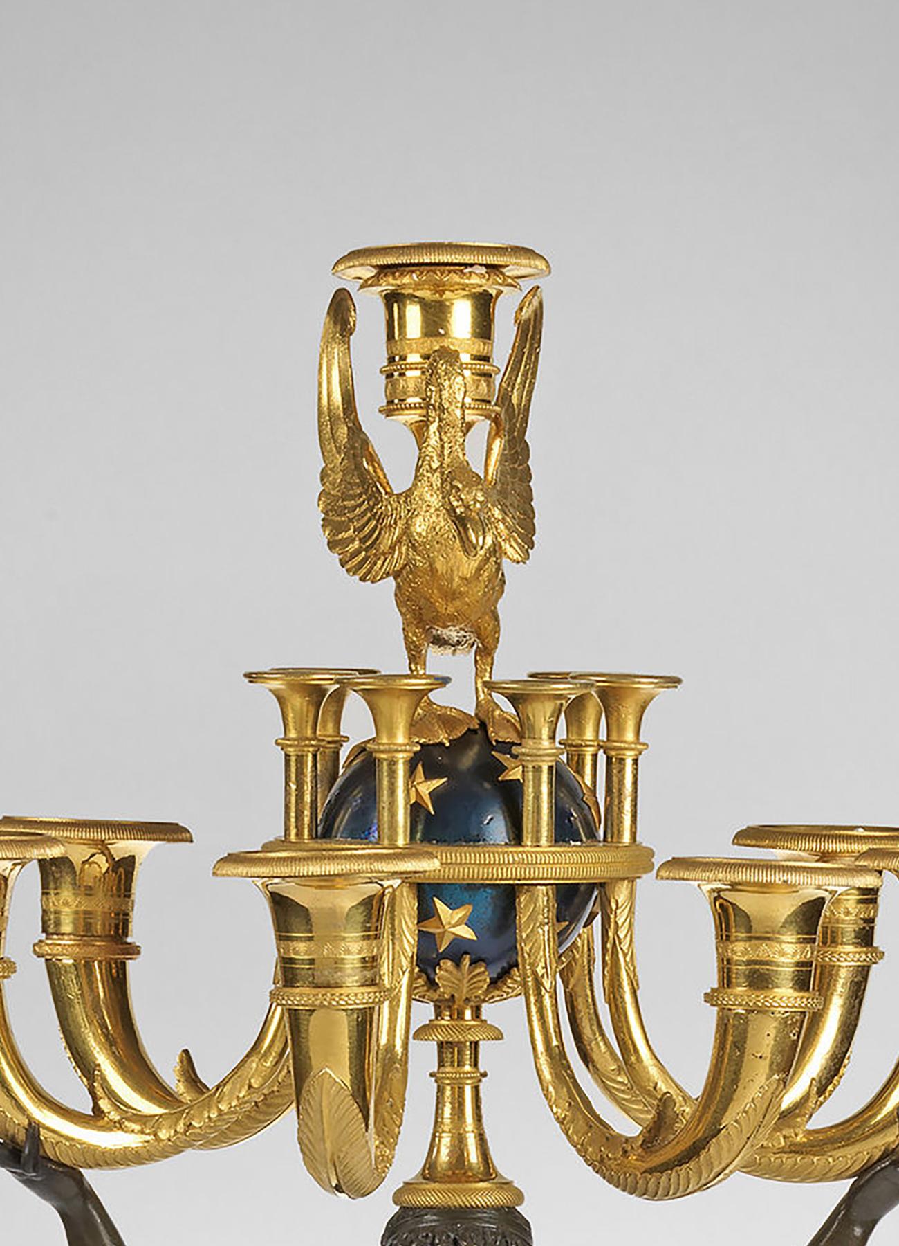 A Pair of Directoire Ormolu, Patinated and Blued-Steel Seven Light Candelabra  In Good Condition For Sale In London, Middlesex