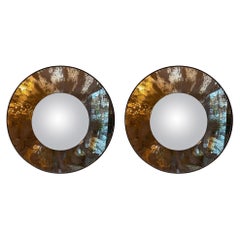 A Pair Of Distressed Convex Mirrors