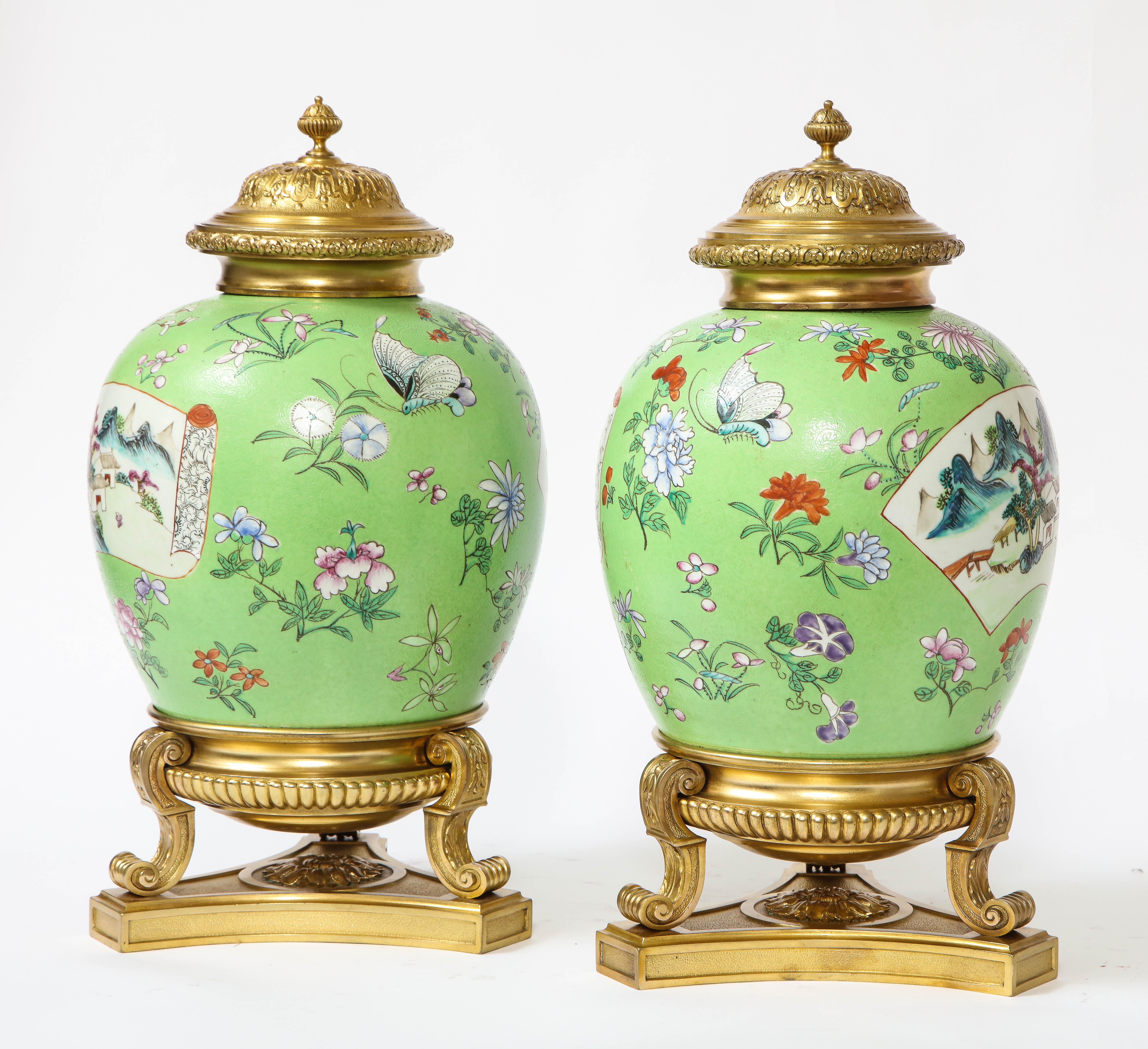 Enameled Pair of Dore Bronze Mounted Chinese Famille Rose Porcelain Vases For Sale