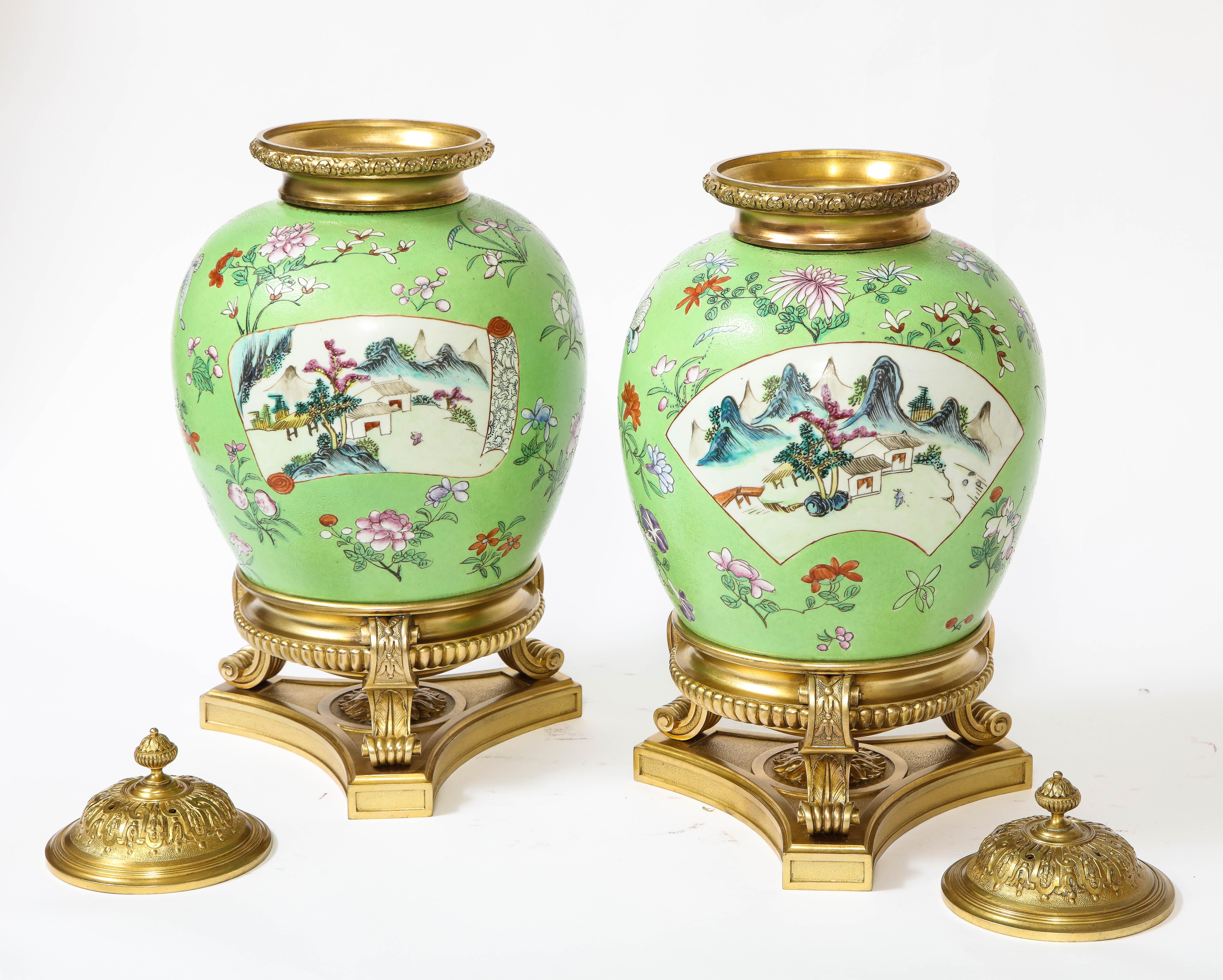 Early 20th Century Pair of Dore Bronze Mounted Chinese Famille Rose Porcelain Vases For Sale