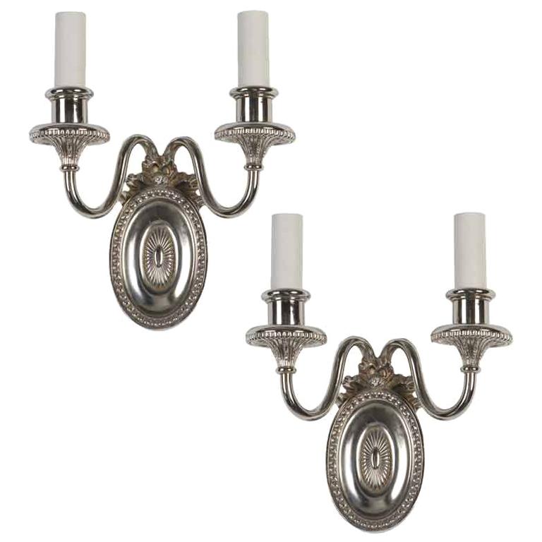 A pair of double-light E. F. Caldwell sconces