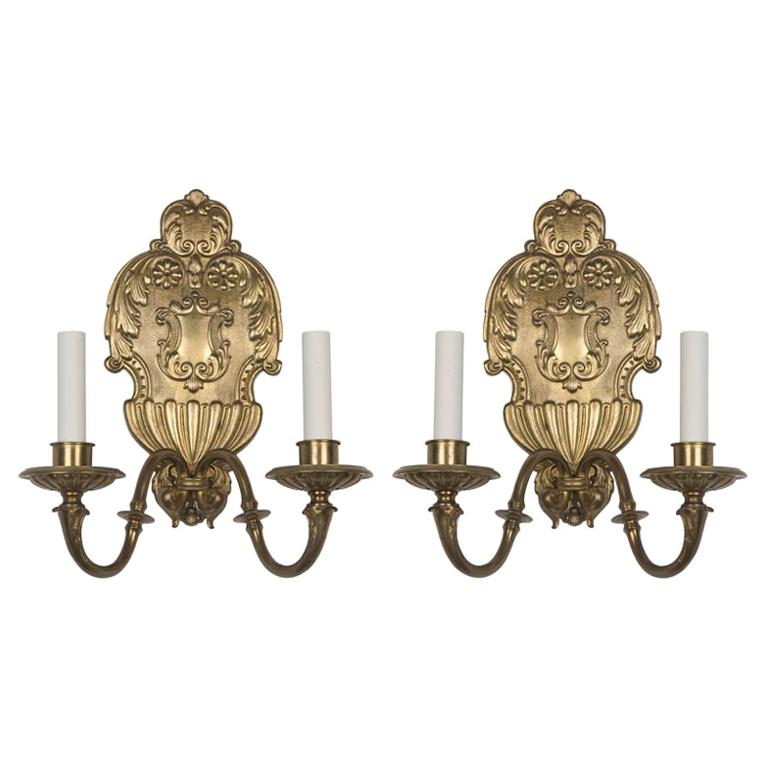 A pair of double-light sconces by the Sterling Bronze Co.