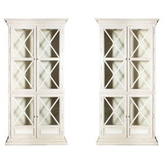 A Pair of Drexel Heritage Neoclassical Style Painted Glazed Door Cabinets