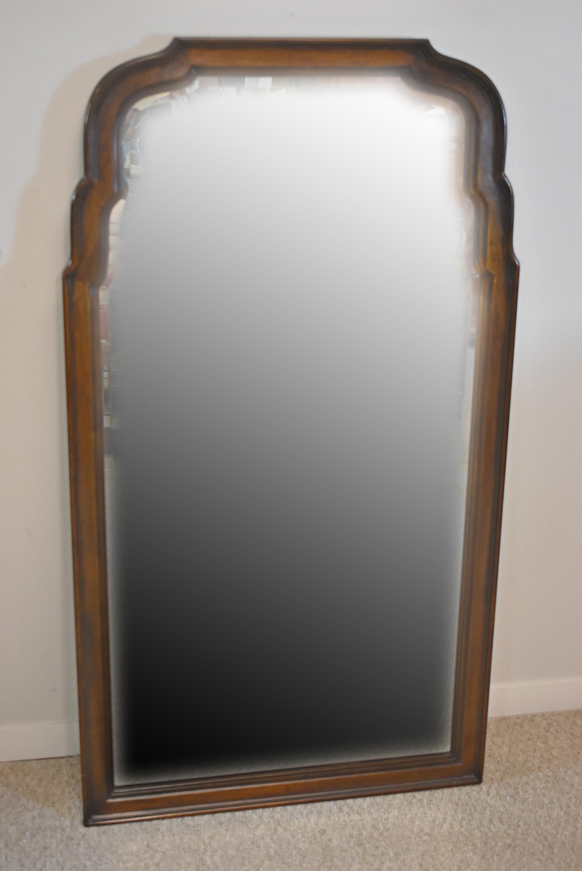 A pair of Drexel mid-century mirrors, 2 available Sold Separately. Circa 18th century as stamped on the back. Walnut frames in original finish. Good condition. Dimensions: 17.50