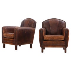 Paire de fauteuils club en cuir de style Art déco hollandais, C 1950.