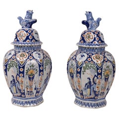 Antique A Pair of Dutch Delft Covered Vases with Foo Dog Finials