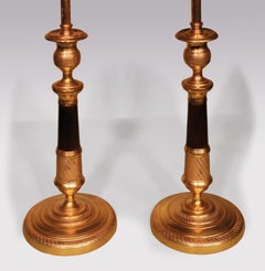 Paire de chandeliers en bronze et bronze doré du début du 19e siècle