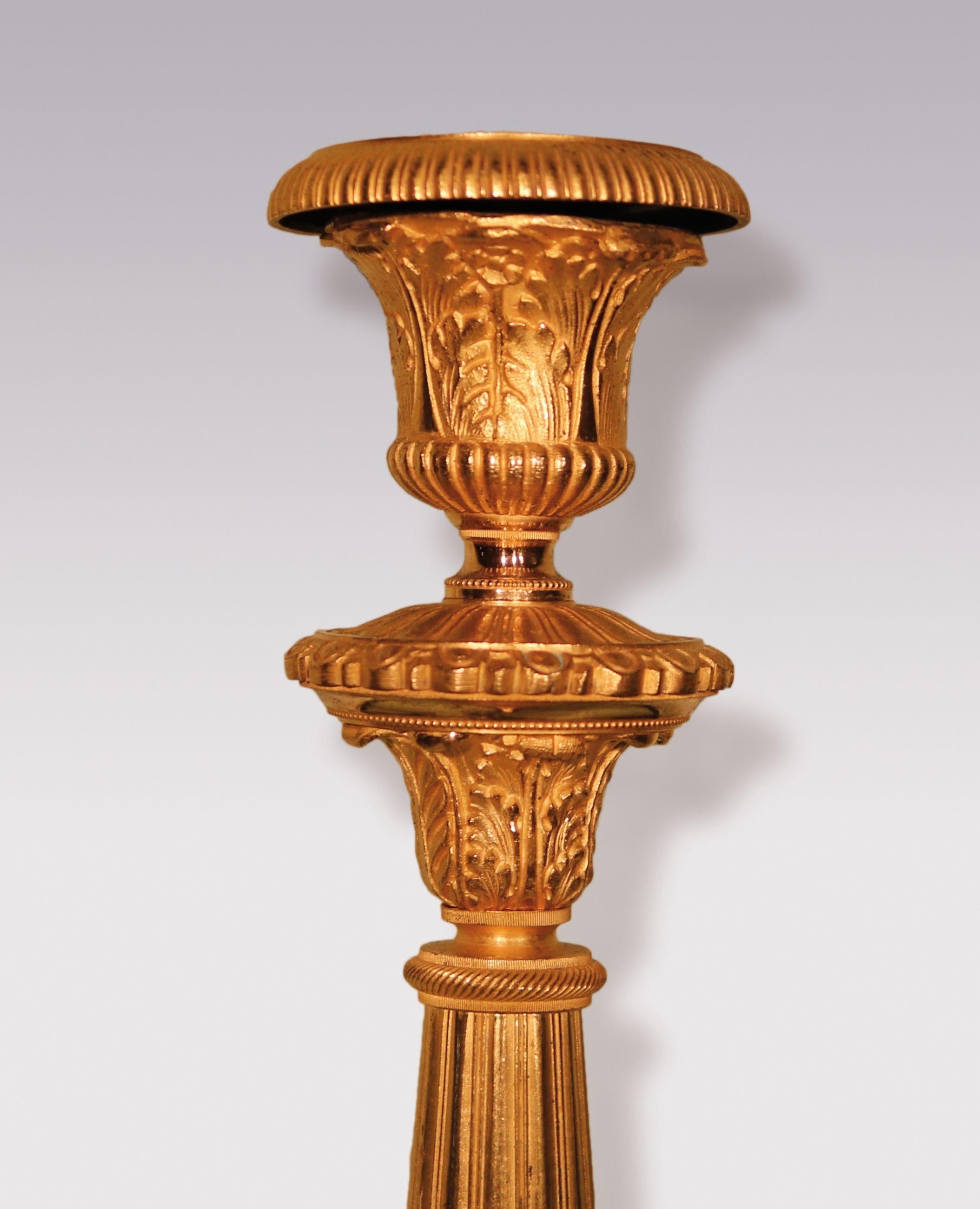 Regency Pair of Early 19th Century Bronze and Ormolu Candlesticks For Sale