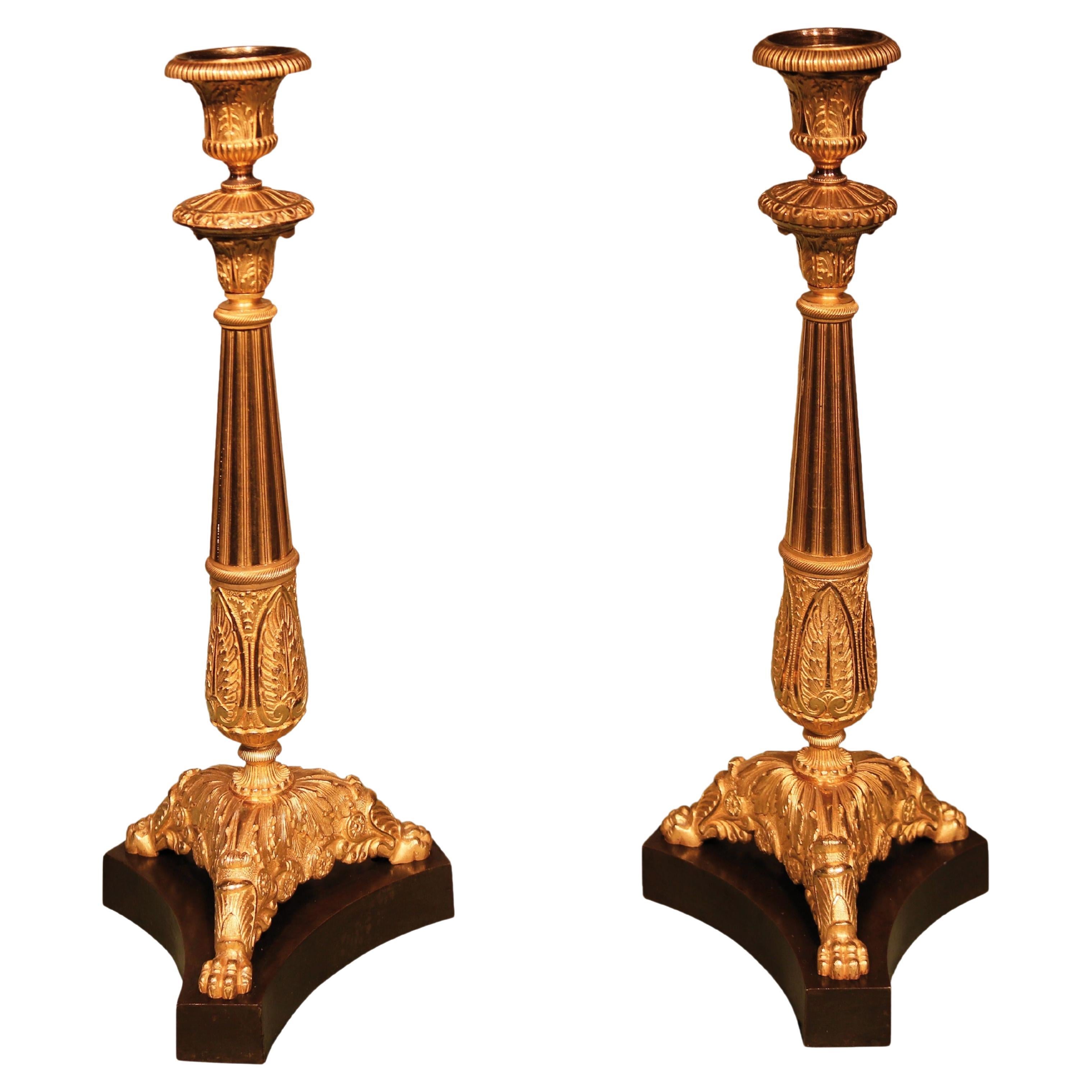 Pair of Early 19th Century Bronze and Ormolu Candlesticks For Sale