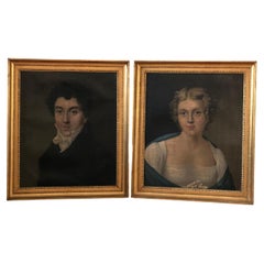 A Pair of Early 19th Century Empire Portrait Paintings of a Married Couple