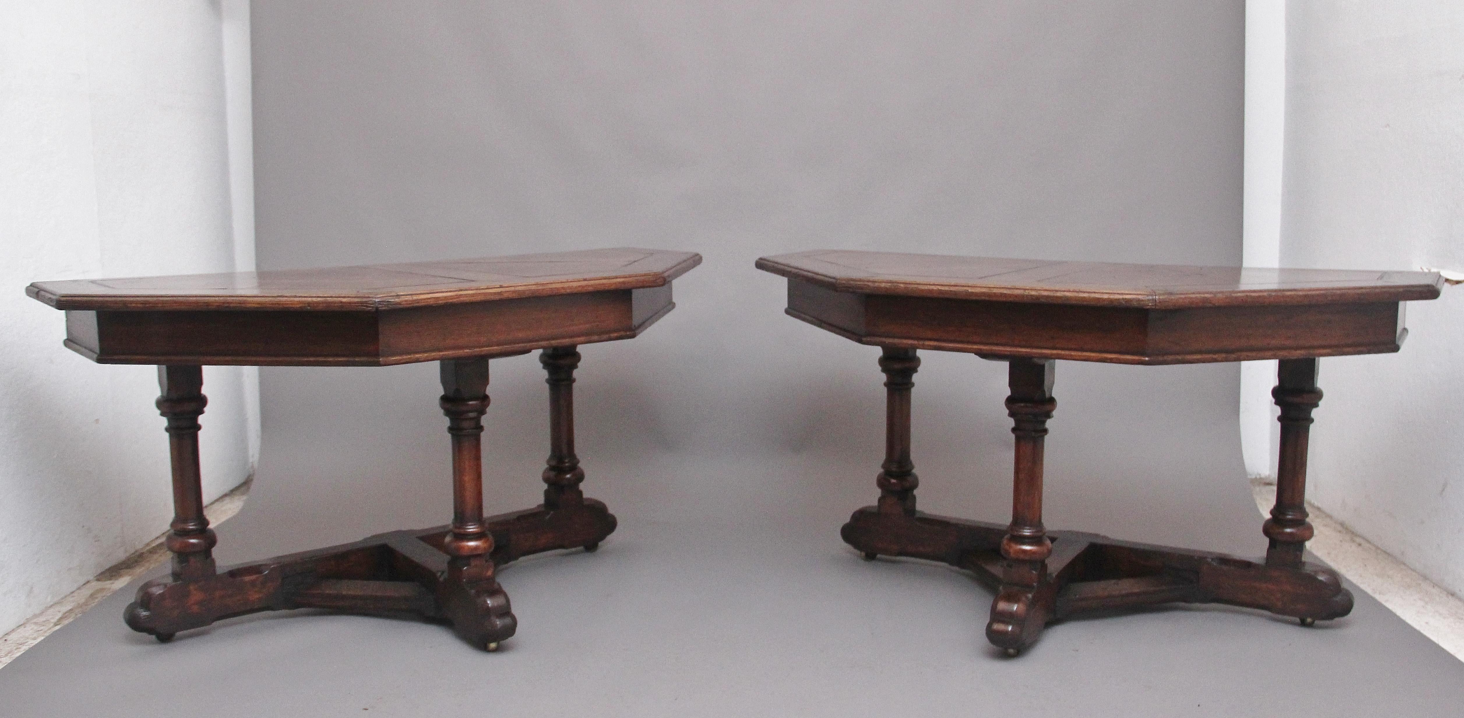 A pair of early 19th century oak console tables / centre table, having lovely shaped and figured tops consisting of two shaped panels on each table with a quadrant circle in the corner of each panel conforming when pushed together as a centre table,