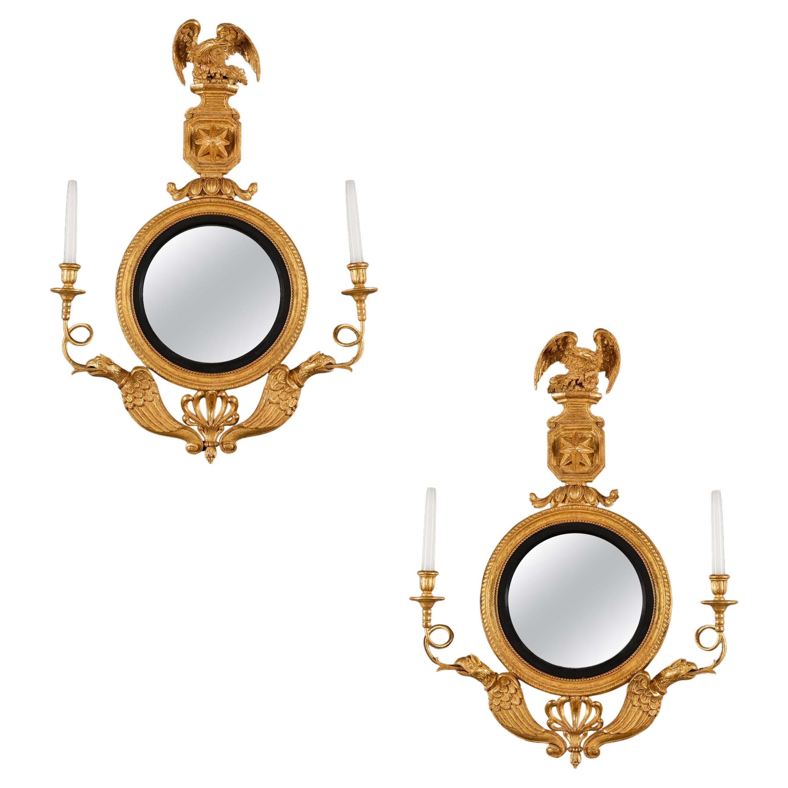 Coppia di specchi Girandole convessi Regency del primo Ottocento