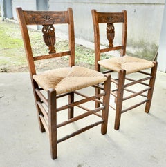 A Pair of Early 19th Century Rush Seated Elm Hall Chairs