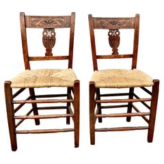 Antique A Pair of Early 19th Century Rush Seated Elm Hall Chairs