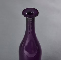 A Pair of Early 20th Century Amethyst Purple Glass Water Carafes