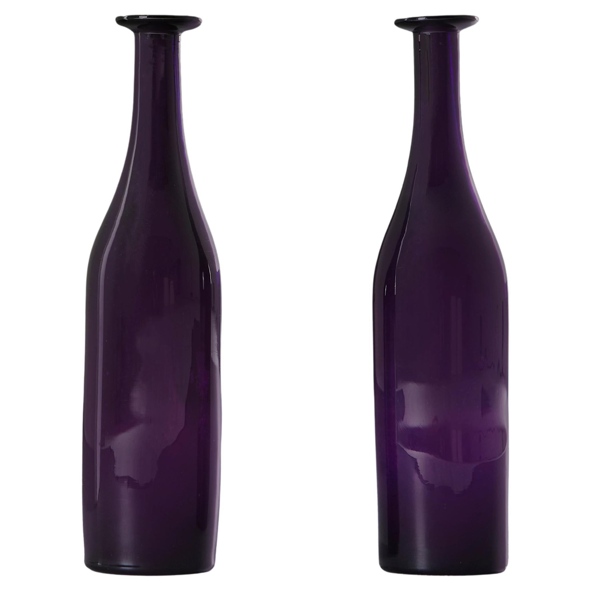 A Pair of Early 20th Century Amethyst Purple Glass Water Carafes