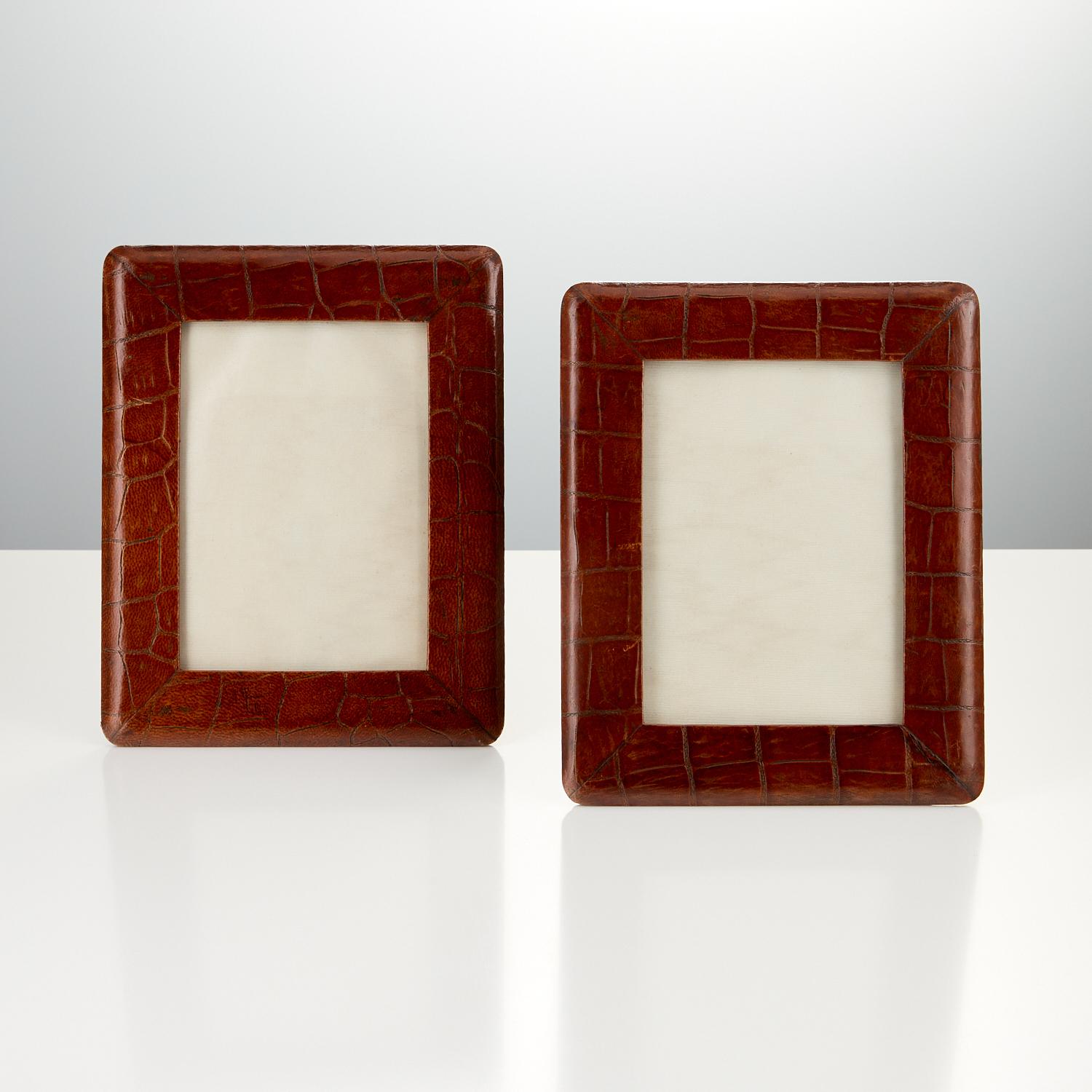 A Pair of Early 20th Century Antique leather photo Frames, Circa 1920.

This pair of Crocodile frames are in very good condition and retain there original patina with just minor use to both frames. The only difference is there is a slight colour
