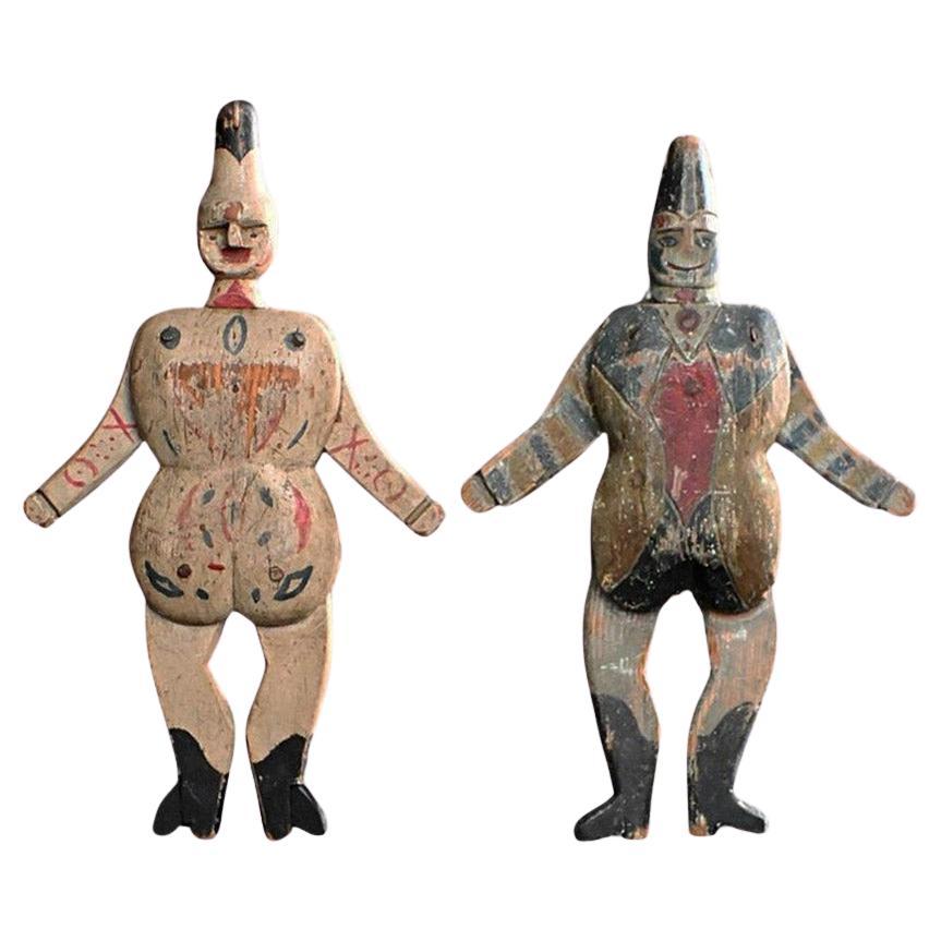 Paire de figurines de Jumping Jack sculptées à la main au début du 20e siècle  en vente