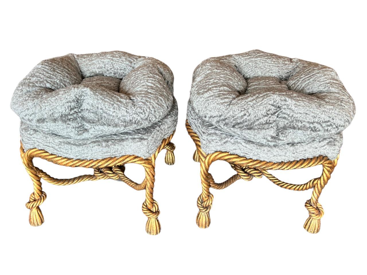 A pair of early 20th century Italian gilt gold metal rope and tassel boudoir stools with an upholstered tufted round pillow seat in Holly Hunt grey mohair fabric called Mammoth.
 