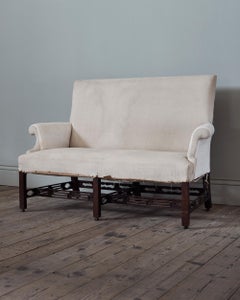 A Pair of Early George III Mahogany Sofas, c. 1765