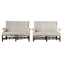 A Pair of Early George III Mahogany Sofas, c. 1765
