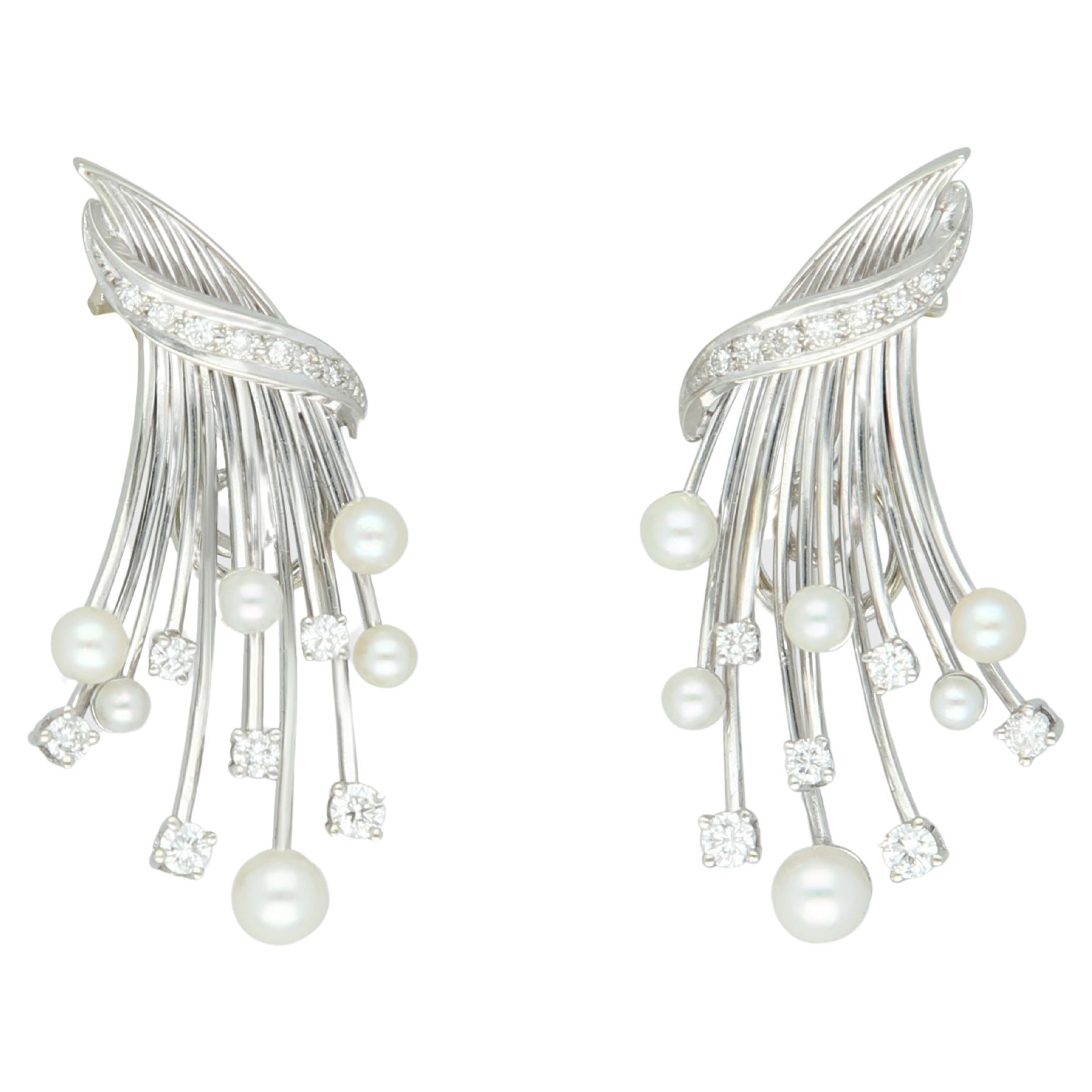 A pair of earrings Art Deco, diamonds and pearls 18K white gold. For Sale