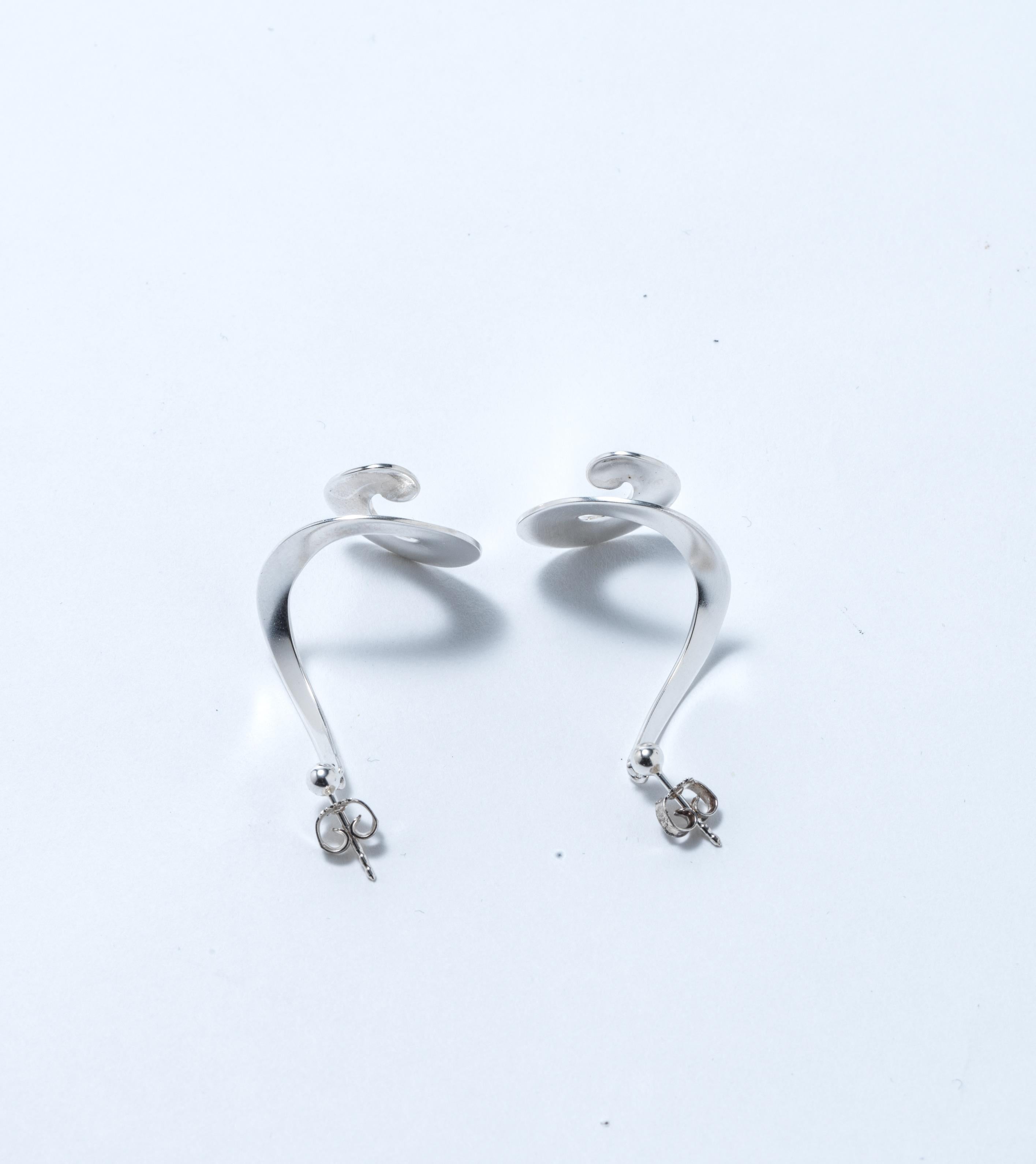 A pair of earrings. 