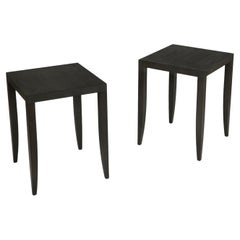 A pair of ebonised ash occasional tables 