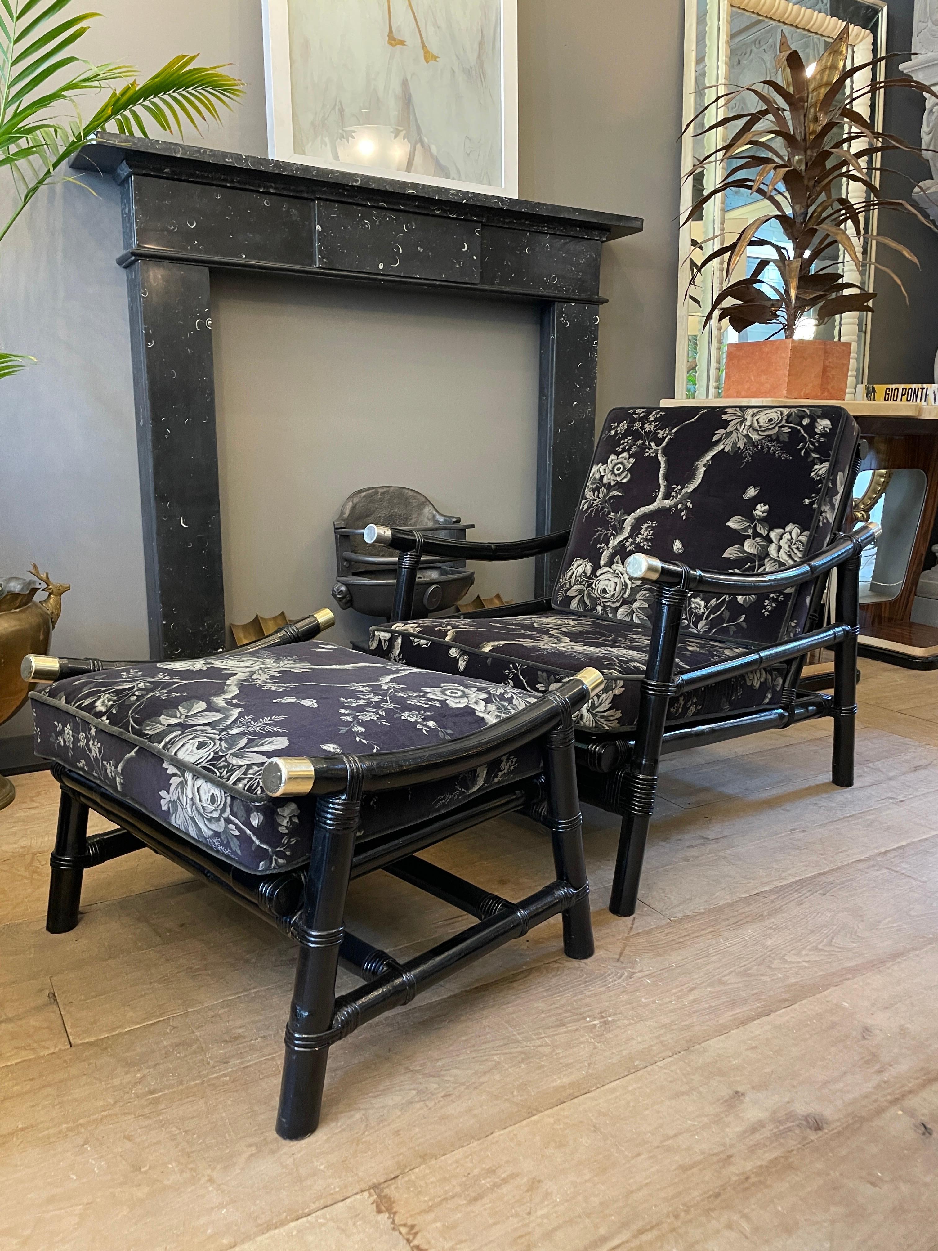 A pair of Original Ebinized Bamboo and Rattan lounge chairs by John Wisner for Ficks Reed, Far Horizon collection. Upholstered in Purple and silver floral Ralph Lauren Velvet. Accompanied by matching foot stools, in great condition, some wear to the